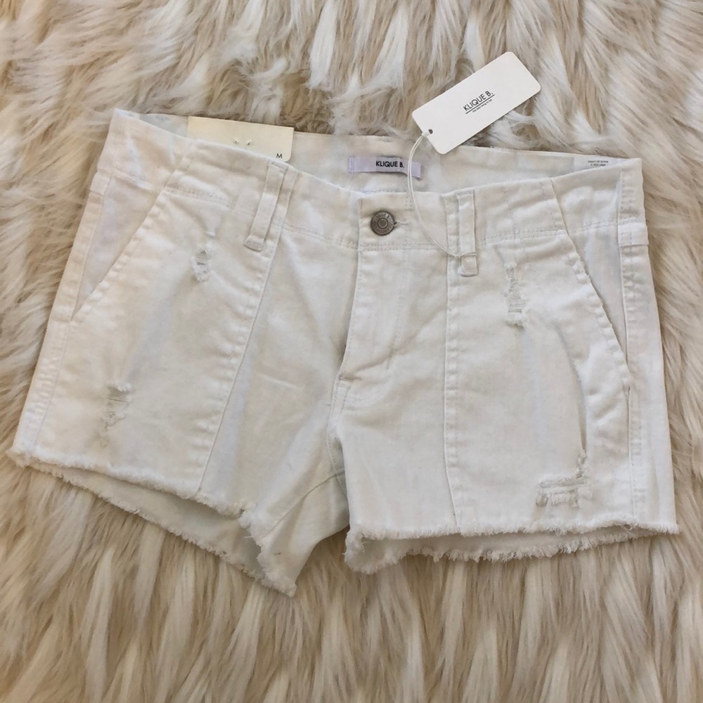 Kilque B. White cut off jean shorts